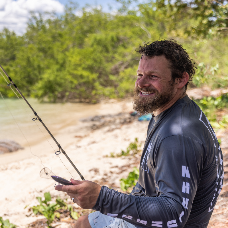Man fishing in gove